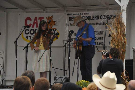 Veronica playing fiddle with Michael playing guitar.